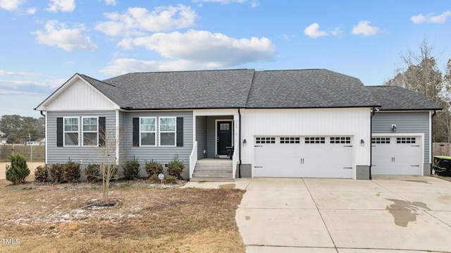 single story home featuring a garage