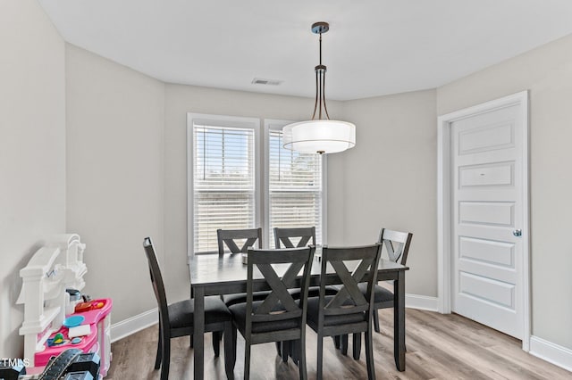 dining room featuring hardwood / wood-style flooring