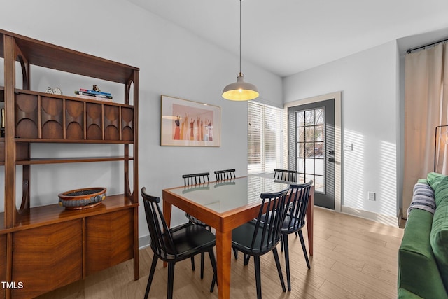 dining space featuring light hardwood / wood-style floors