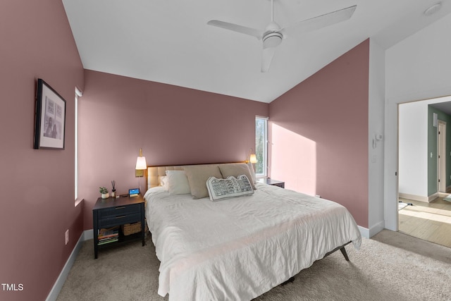 carpeted bedroom with lofted ceiling and ceiling fan