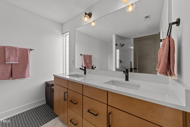 bathroom featuring vanity and a tile shower