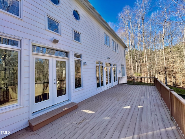 wooden terrace featuring french doors