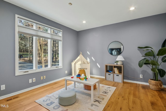 game room featuring light hardwood / wood-style flooring