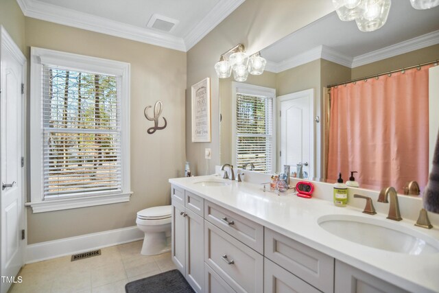 bathroom featuring tile patterned flooring, a sink, toilet, and baseboards