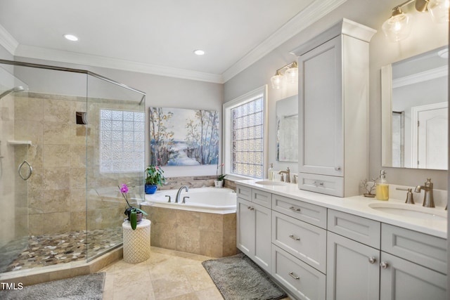 bathroom with ornamental molding, a sink, and a shower stall