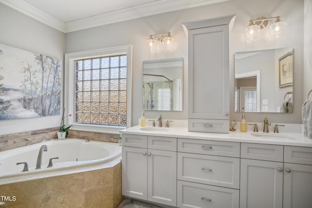 full bath with crown molding, a sink, a bath, and a shower stall