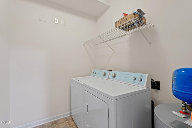 laundry room featuring washing machine and dryer