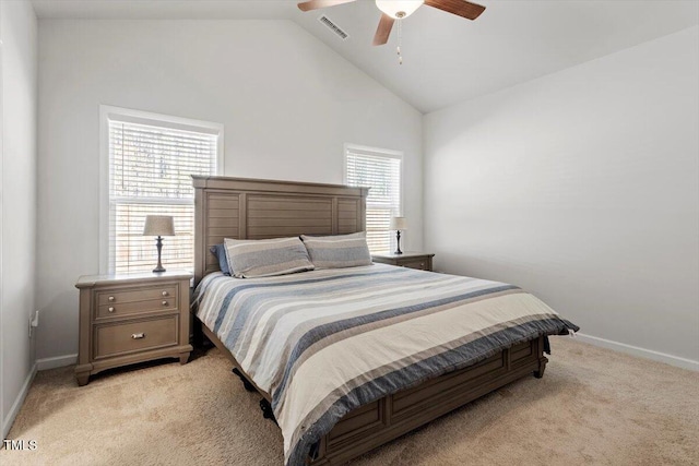 bedroom featuring lofted ceiling, baseboards, visible vents, and light colored carpet