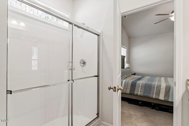 bathroom featuring a healthy amount of sunlight, ensuite bath, a shower stall, and ceiling fan