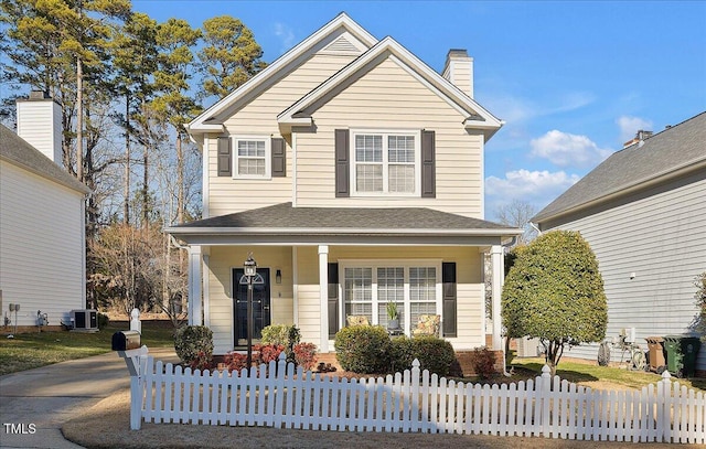 front of property featuring central AC unit and covered porch