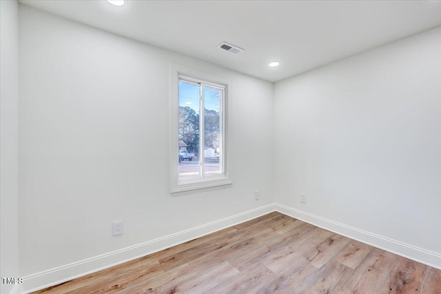 empty room with light wood-type flooring