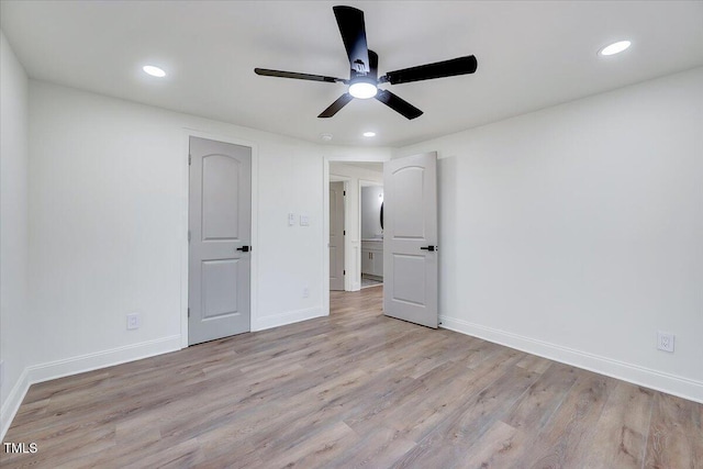 unfurnished bedroom featuring ceiling fan and light hardwood / wood-style floors