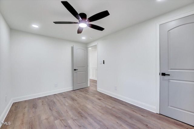 unfurnished bedroom with light wood-type flooring and ceiling fan