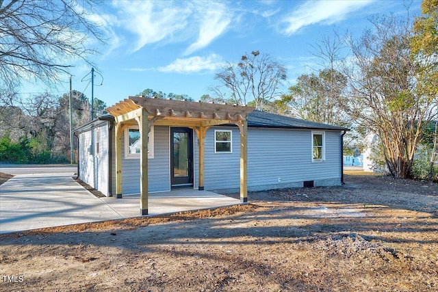 exterior space featuring a pergola and a patio