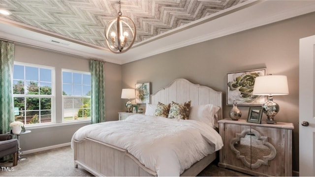 bedroom featuring carpet, a raised ceiling, ornamental molding, and a notable chandelier