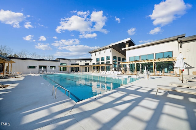 view of swimming pool featuring a patio