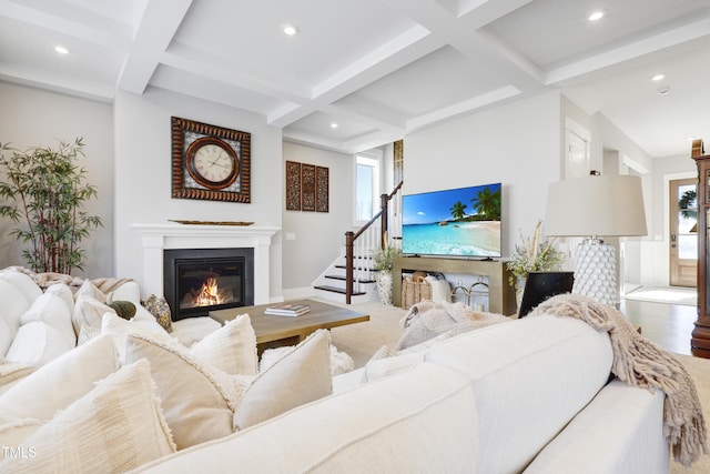 living room with hardwood / wood-style flooring, beam ceiling, and coffered ceiling