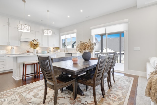 dining room featuring dark hardwood / wood-style flooring