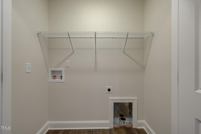 laundry room with dark hardwood / wood-style floors, hookup for a washing machine, and electric dryer hookup