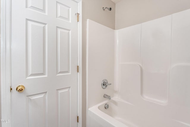 bathroom with shower / bathing tub combination