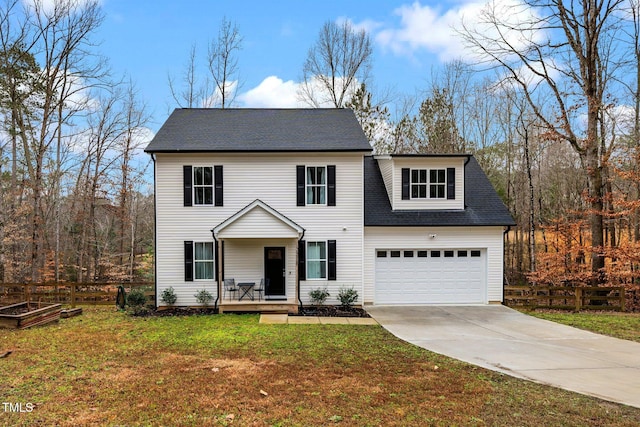 view of front of property with a garage, a porch, and a front lawn