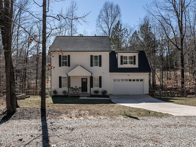 view of front of home featuring a garage and covered porch