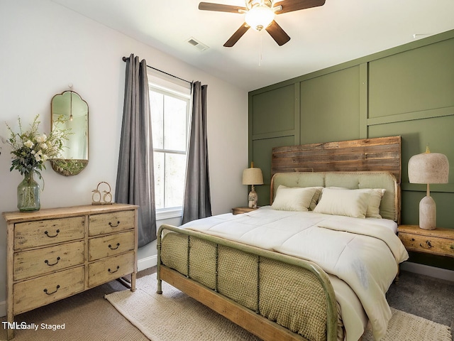 carpeted bedroom featuring ceiling fan