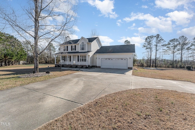 view of front of home with a porch, a garage, and a front lawn