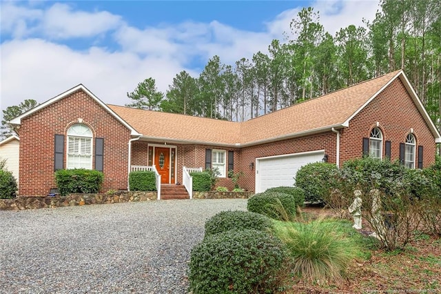 ranch-style house featuring a garage