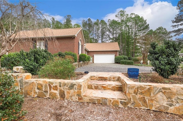 view of side of property with a garage