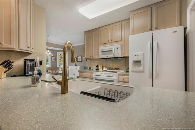 kitchen featuring decorative backsplash, white appliances, light brown cabinets, pendant lighting, and a chandelier