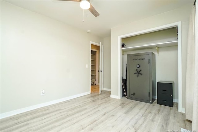 unfurnished bedroom with a closet, ceiling fan, and light hardwood / wood-style floors