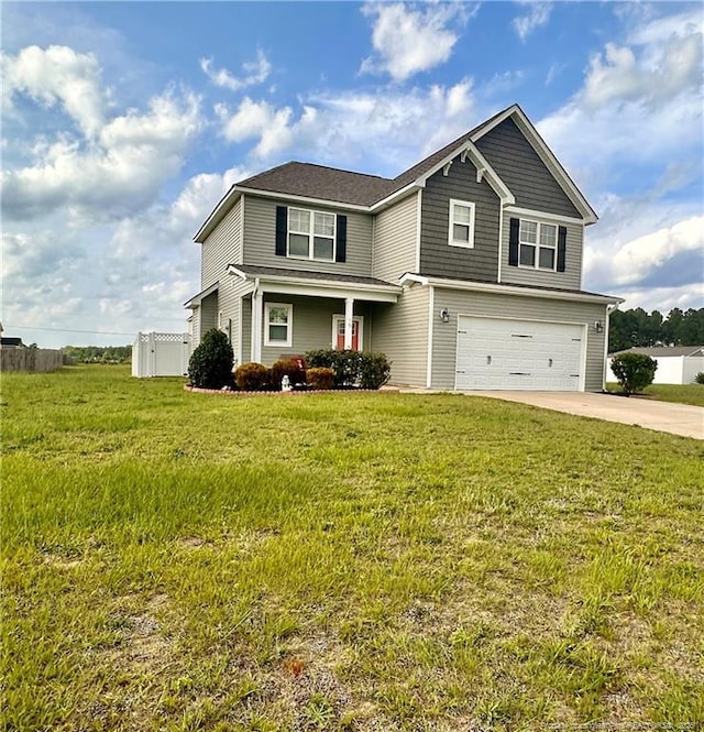 view of front facade featuring a garage and a front yard