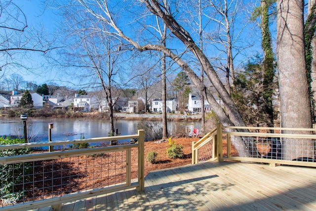 deck featuring a water view