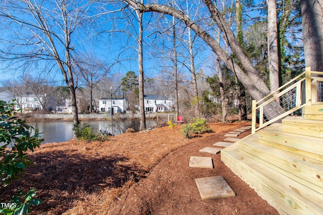 view of yard with a water view