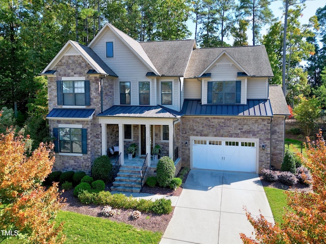 craftsman-style house with a garage and a porch