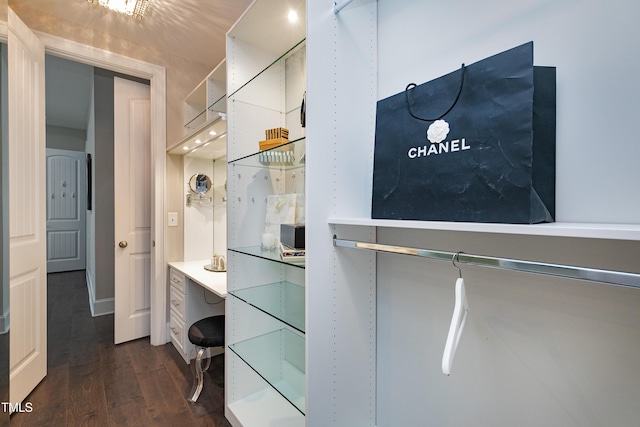 walk in closet featuring dark hardwood / wood-style flooring