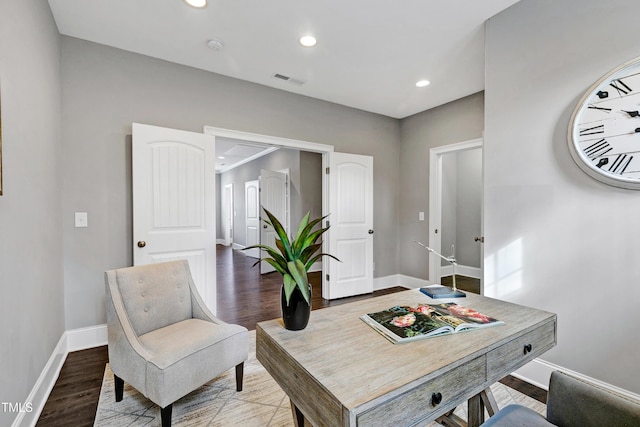 home office with hardwood / wood-style floors