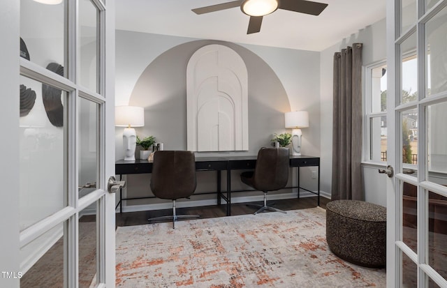 office space featuring ceiling fan, dark wood-type flooring, and french doors