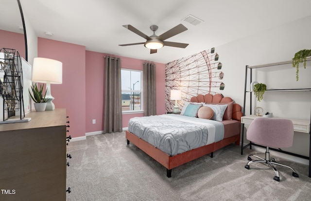 bedroom featuring ceiling fan and light colored carpet