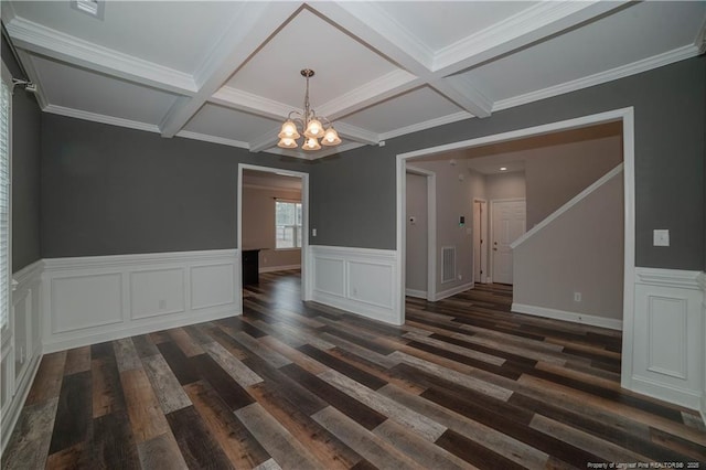 interior space with crown molding, a chandelier, and dark hardwood / wood-style floors