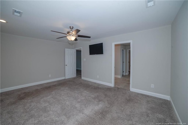 empty room with carpet and ceiling fan