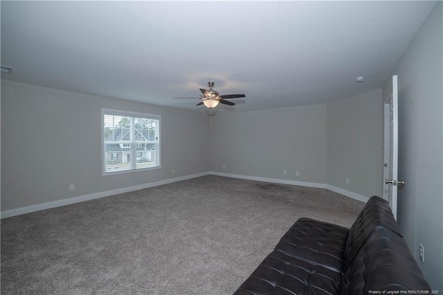 unfurnished living room with ceiling fan and carpet floors