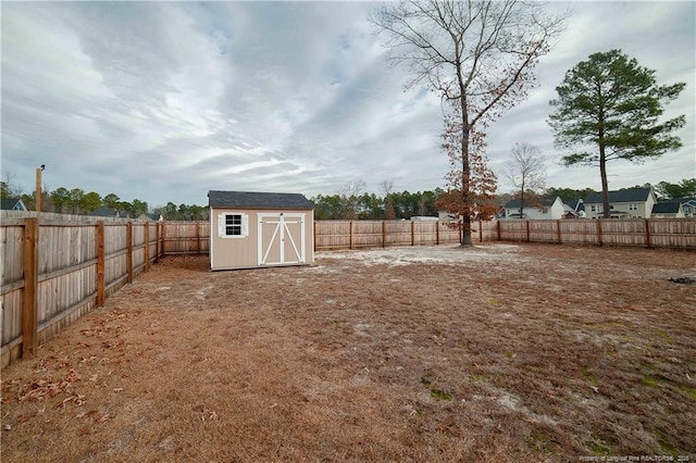 view of yard featuring a storage shed