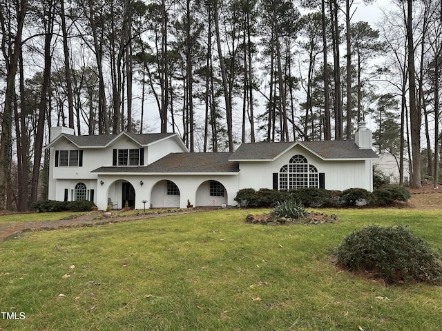 view of front of property with a front lawn