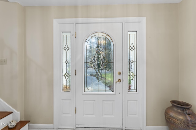 foyer entrance featuring a healthy amount of sunlight