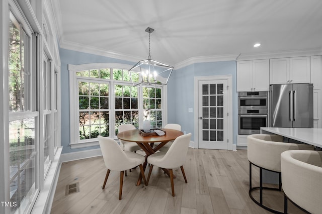 71012 Russell, Chapel Hill, NC 27517 - dining space featuring a chandelier, light wood finished floors, ornamental molding, baseboards, and recessed lighting