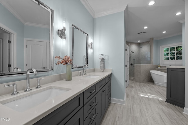 71012 Russell, Chapel Hill, NC 27517 - bathroom with a stall shower, double vanity, ornamental molding, a soaking tub, and recessed lighting