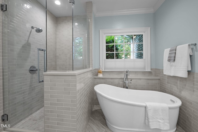 71012 Russell, Chapel Hill, NC 27517 - bathroom with tile walls, a shower stall, a freestanding bath, crown molding, and a wainscoted wall