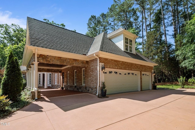 71012 Russell, Chapel Hill, NC 27517 - view of front of property with driveway, roof with shingles, brick siding, and stone siding
